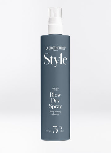 Blow Dry Spray is the perfect strengthening base layer for a smooth blowout or before putting the hair in curlers. It offers medium hold, added shine, and anti-static properties- all while looking (and feeling) extra soft. Shop online or in store at Shampoo Har Bar in Victoria, BC. 