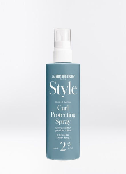 Curl Protecting Spray is not your average heat protector. This product is ideal for anyone who struggles to get lasting styles with hot tools by prepping the hair with added grip. Shop online or in store at Shampoo Hair Bar in Victoria, BC.