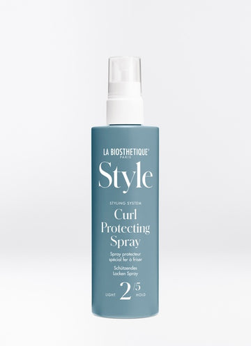 Curl Protecting Spray is not your average heat protector. This product is ideal for anyone who struggles to get lasting styles with hot tools by prepping the hair with added grip. Shop online or in store at Shampoo Hair Bar in Victoria, BC.